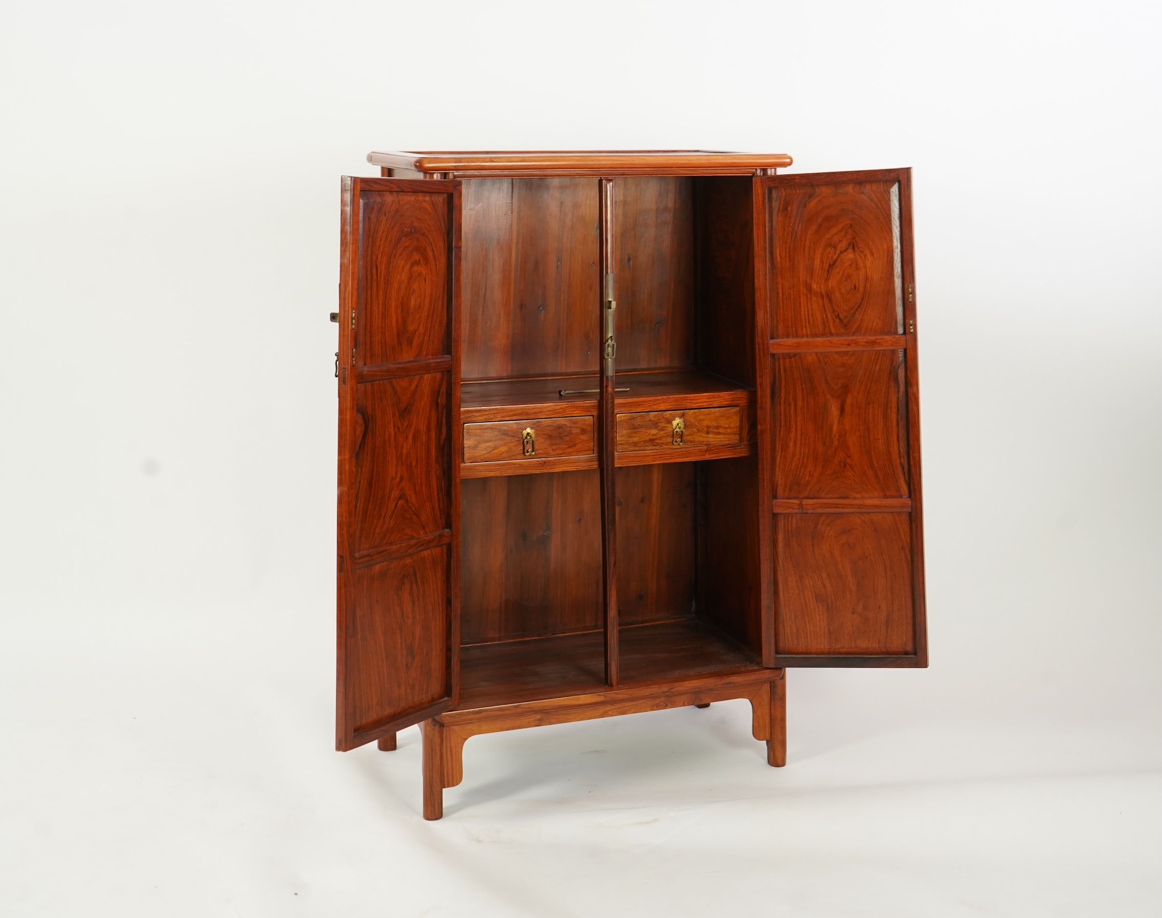 A Chinese huanghuali round-corner cabinet, yuanjiaogui, 19th/20th century